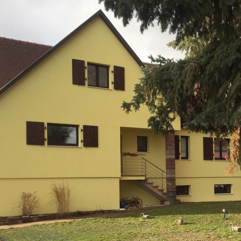 Façade en crépis sur fibre de bois